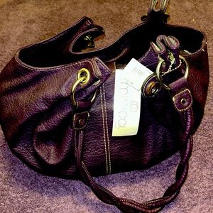 Purple hand bag by Minicci brand new braided handles only $16